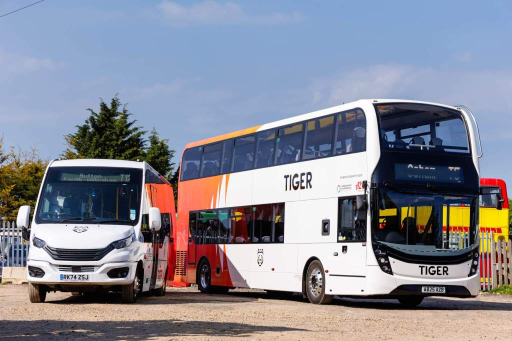 Image from Cambridgeshire and Peterborough Combined Authority of two buses in the 'Tiger' colours.